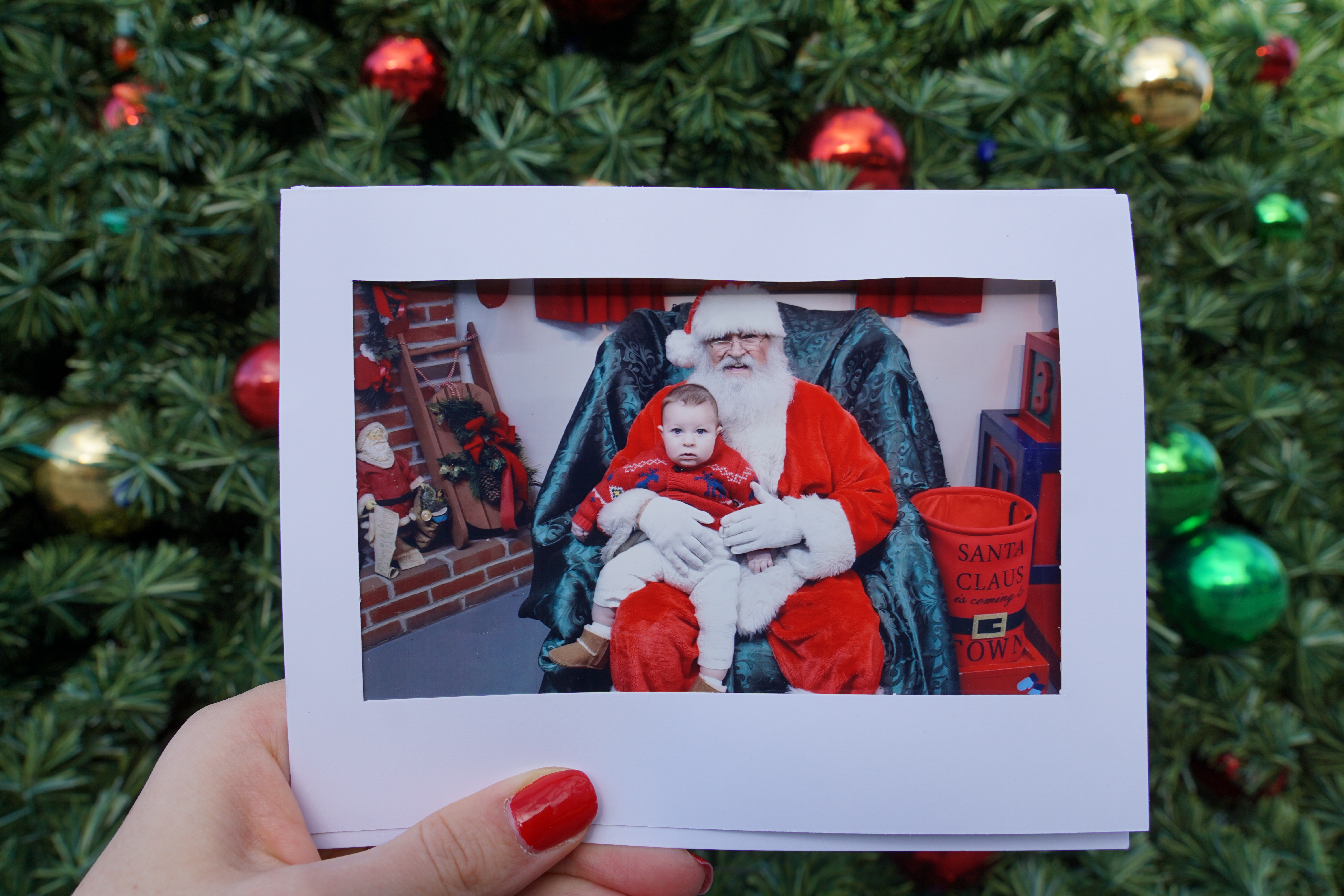 baby and santa picture at Koziars Christmas Village